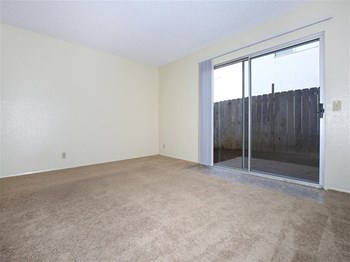 Living room with view patio - Photo Gallery 6