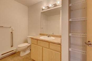 Bathroom Storage at Falls Creek Apartments | Couer D'Alene, ID 83815 - Photo Gallery 13