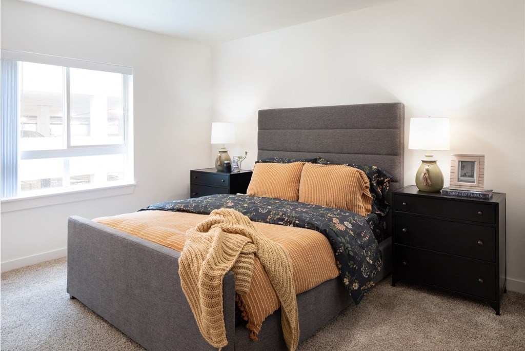 Spacious Bedroom With Plush Carpeting And Large Window For Natural Sunlight at FARM BY VINTAGE, Washington, 98012