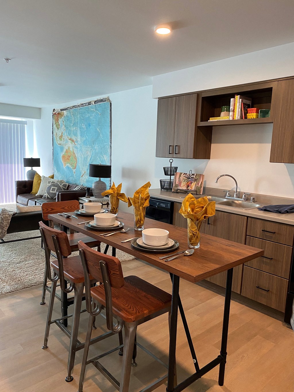 a kitchen and dining room with a wooden table and chairs at FARM BY VINTAGE, MILL CREEK, 98012
