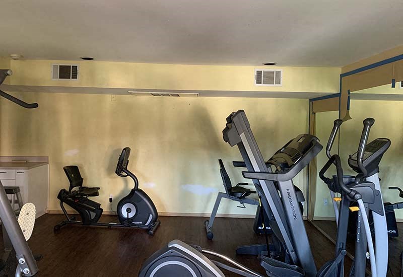 Fitness room with cardio equipment 