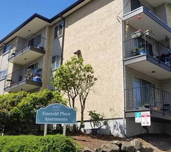 Property sign near building and landscape - Photo Gallery 5