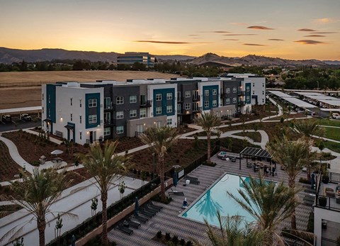 Vacaville Apartments for Rent-Strada 1200 Apartments Exterior of Complex With Aerial Pool view and Builidng