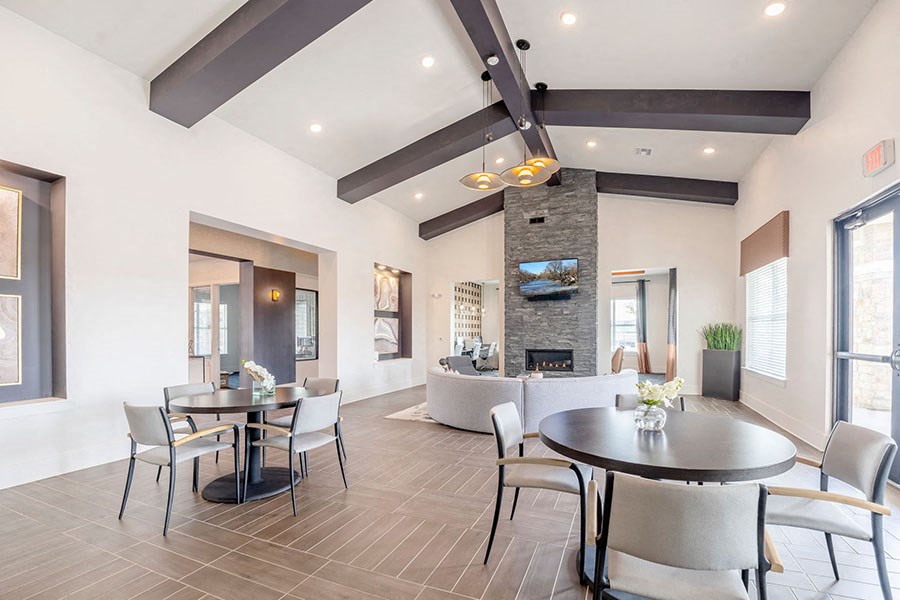 Clubhouse area with seating near windows 