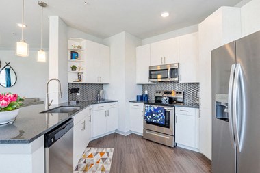 Large kitchen with stainless steel appliances 
