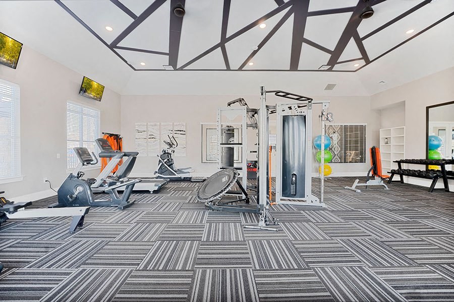 Fitness room with cardio and strength equipment 