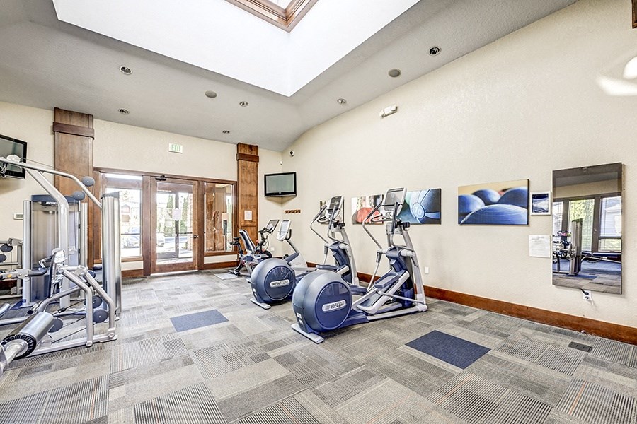 Gym with cardio equipment at BELLA SONOMA, Fife, WA