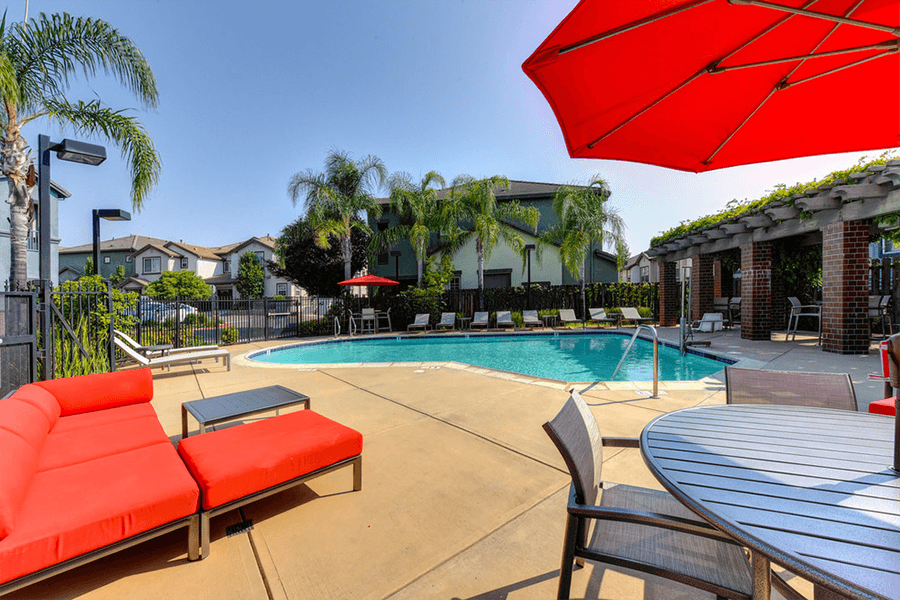 Pool with lounge chairs | The Terraces at Stanford Ranch in Rocklin, CA 95677