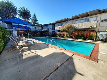 Pool with lounge chairs at GLENWOOD GARDEN, California, 94041