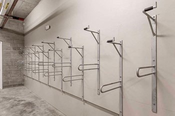 Apartments in Oakland for Rent - Idora - Gray Wall with Bike Storage Racks - Photo Gallery 5