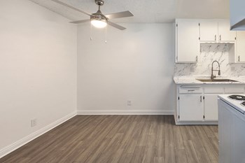 Kitchen and dining with wood floors - Photo Gallery 2
