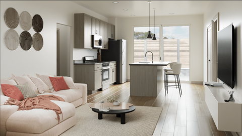A modern living room with a white sofa and a coffee table.