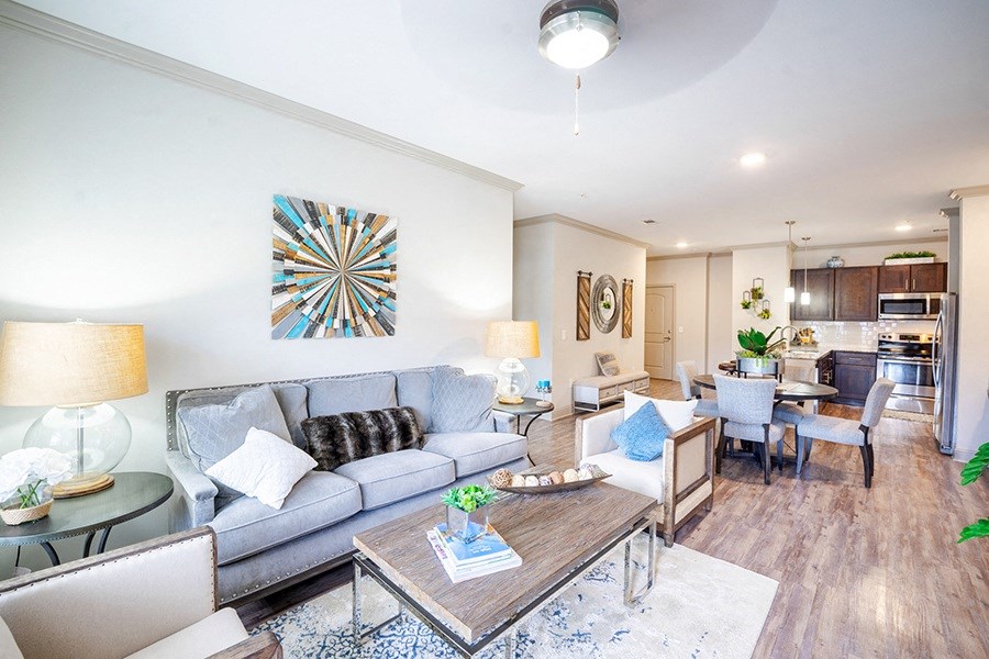 Bright living spaces with plank flooring and modern touches