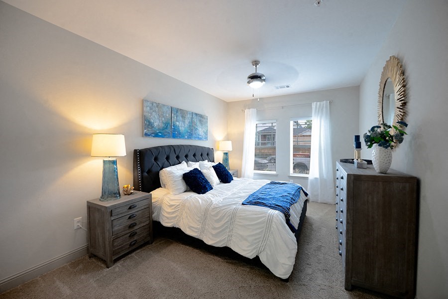 Spacious bedroom with large windows