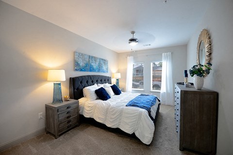Spacious bedroom with large windows