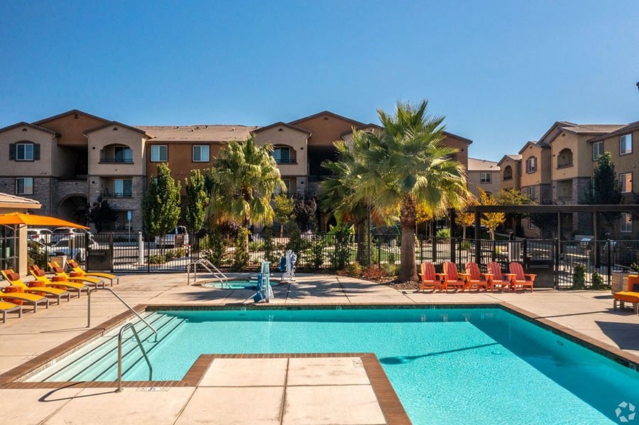 Apartments for Rent in Roseville CA - Harvest at Fiddyment Ranch - Sparkling Pool Surrounded by Lounge Seating