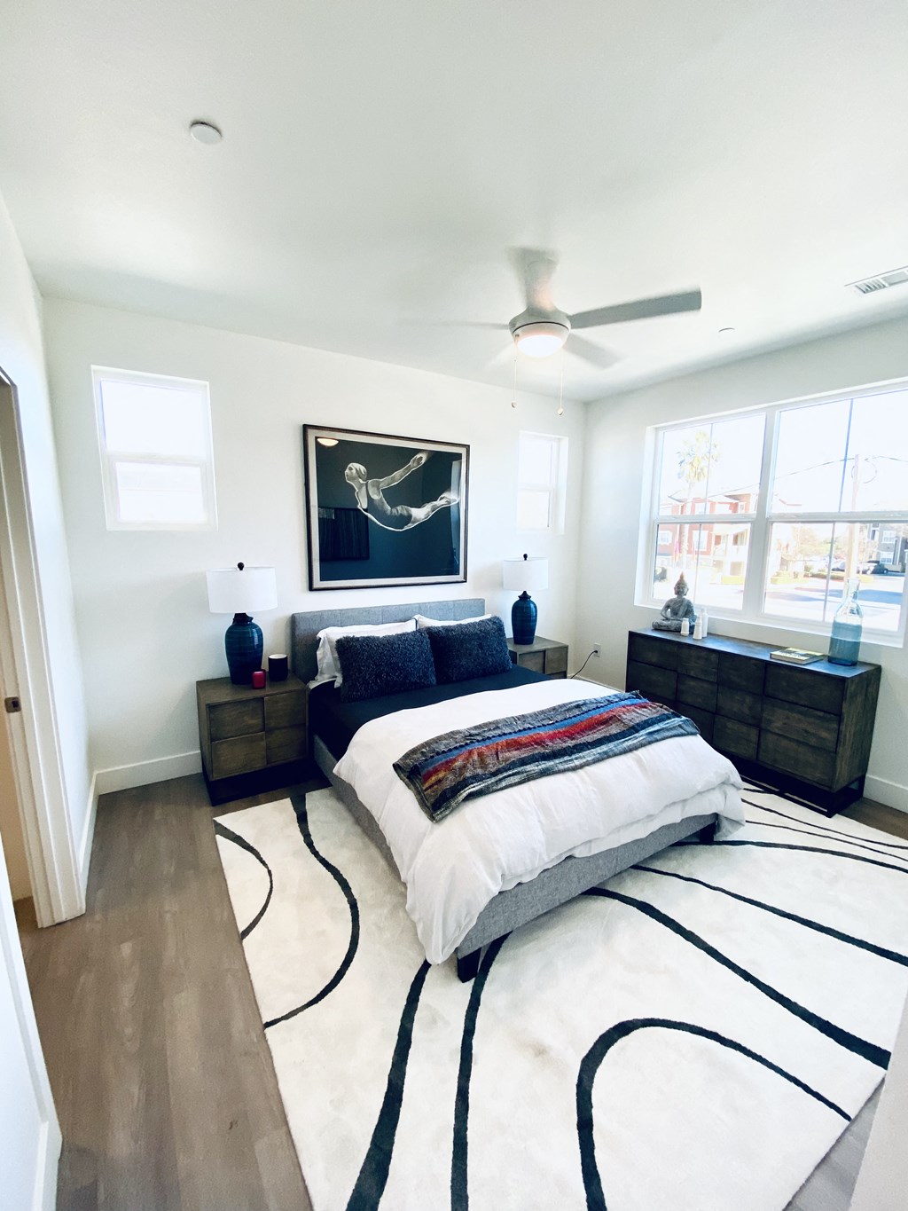 Two Bedroom Townhomes in Vacaville CA - The Preserve at Harbison - Bedroom with Three-Bedrooms, a Ceiling Fan, and Wood-Style Flooring