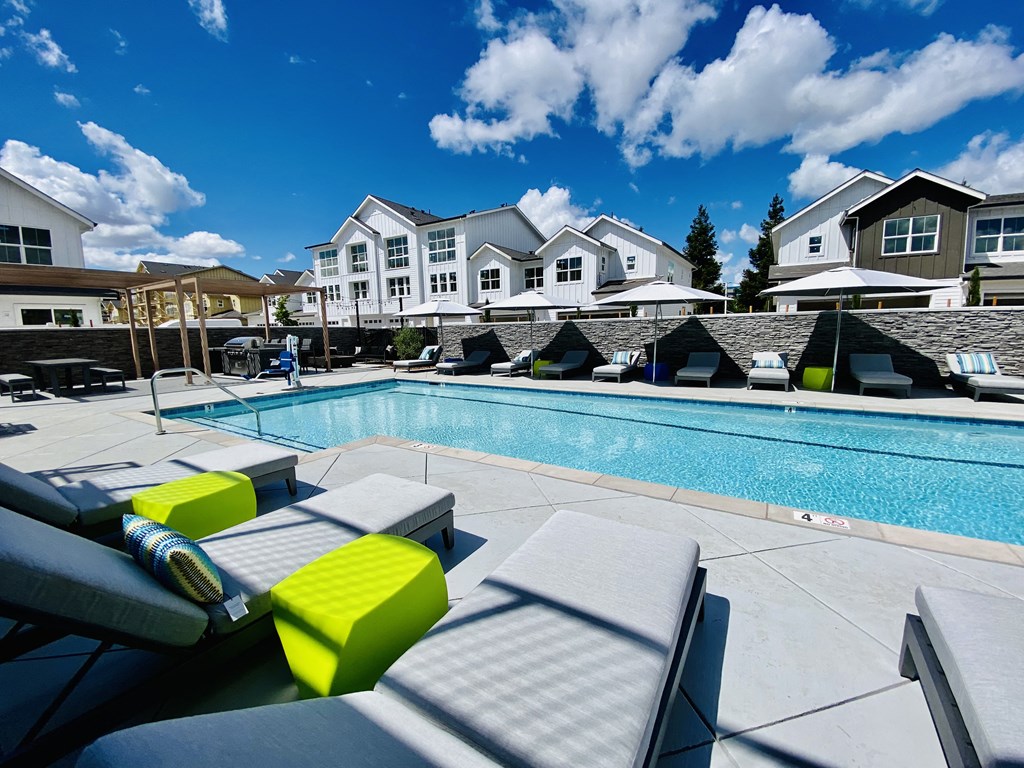 Townhomes in Vacaville CA - The Preserve at Harbison - Resort Style Pool with Seating and Sun Chairs