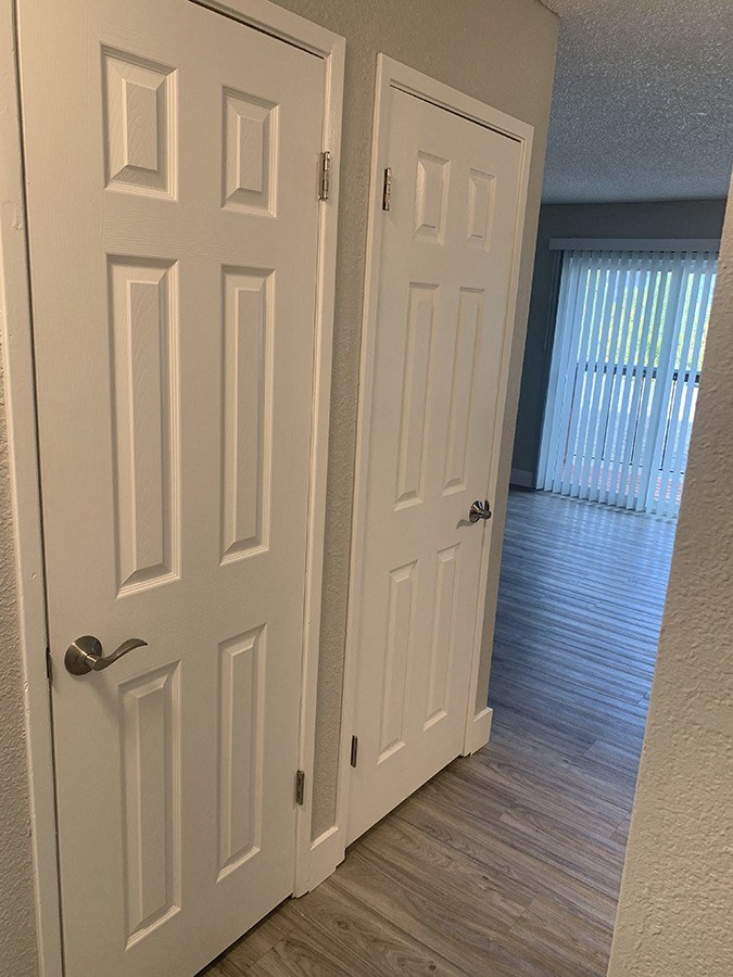 Plank flooring and view of patio