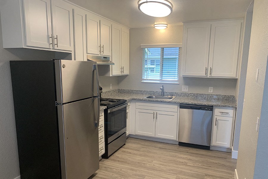 Full kitchen view with stainless steel appliances