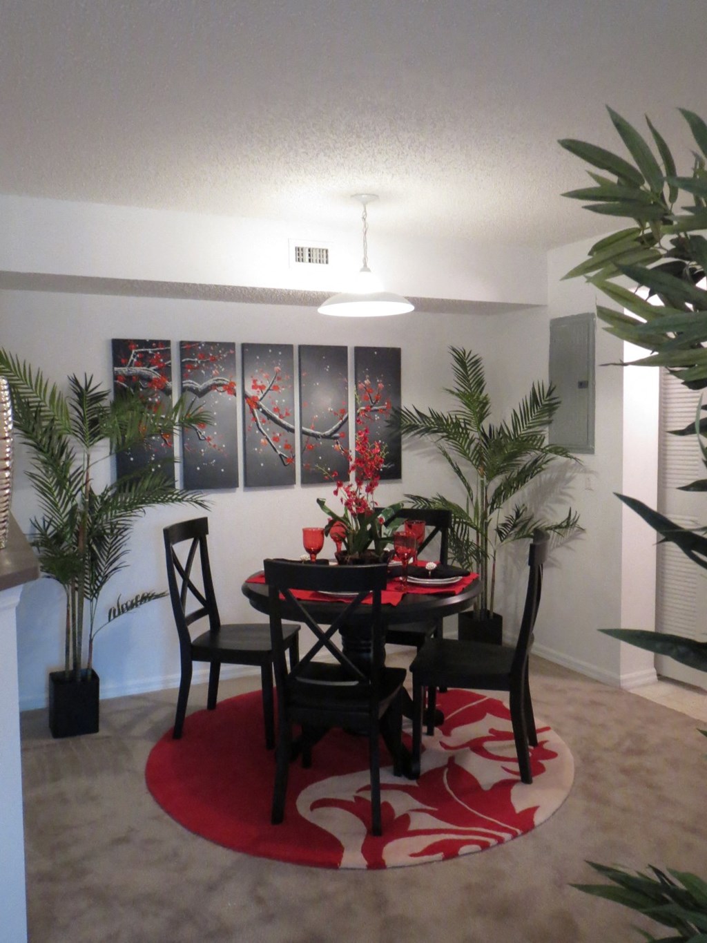 Monterey Pointe Apartments apartment home dining area with overhead lighting at Monterey Pointe, Homestead