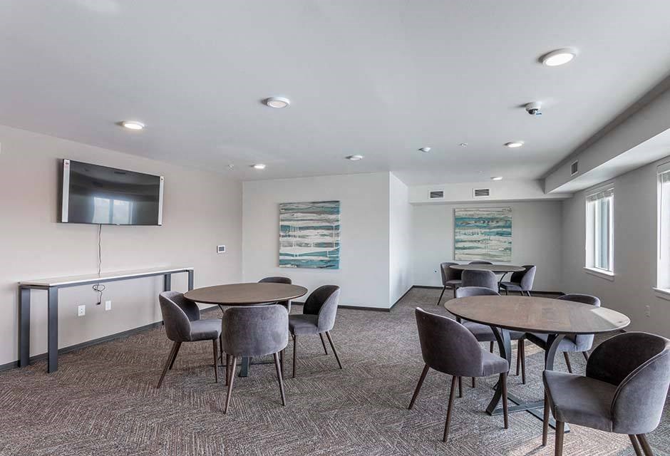 table and chairs with TV