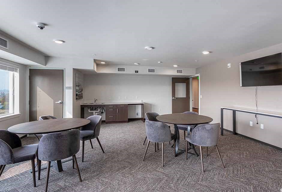 table and chairs with TV