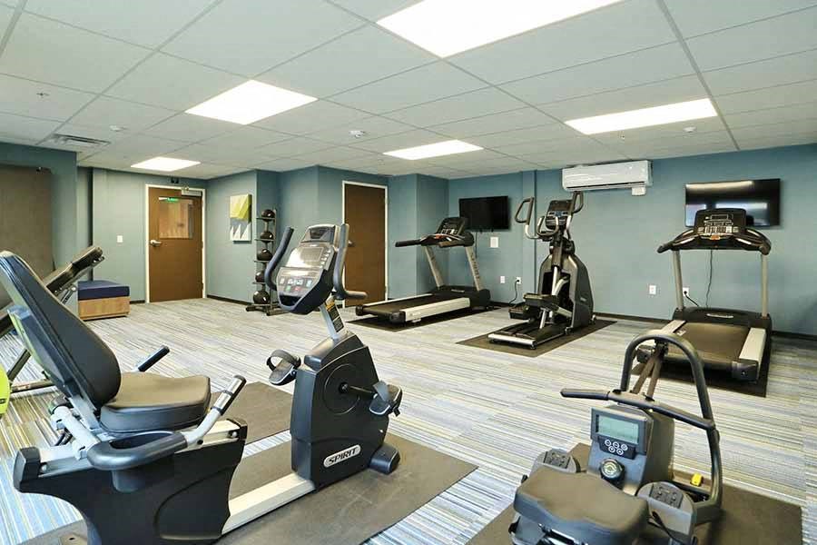 Apartments in Arlington for Rent - Cedar Pointe - Resident Fitness Center with Treadmills, Ellipticals, and Other Workout Equipment