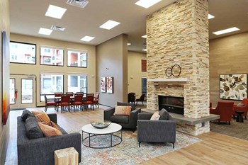 Arlington Apartments for Rent - Cedar Pointe Apartments Clubhouse Complete with a Fireplace and Plenty of Indoor Seating - Photo Gallery 3