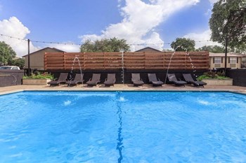 Langtry Village pool with lounge chairs - Photo Gallery 6