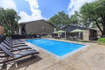 Langtry Village pool with lounge chairs - Photo Gallery 3