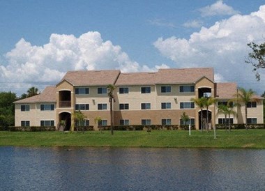 Lake view near buildings and grass Bristol Bay in Tampa Florida