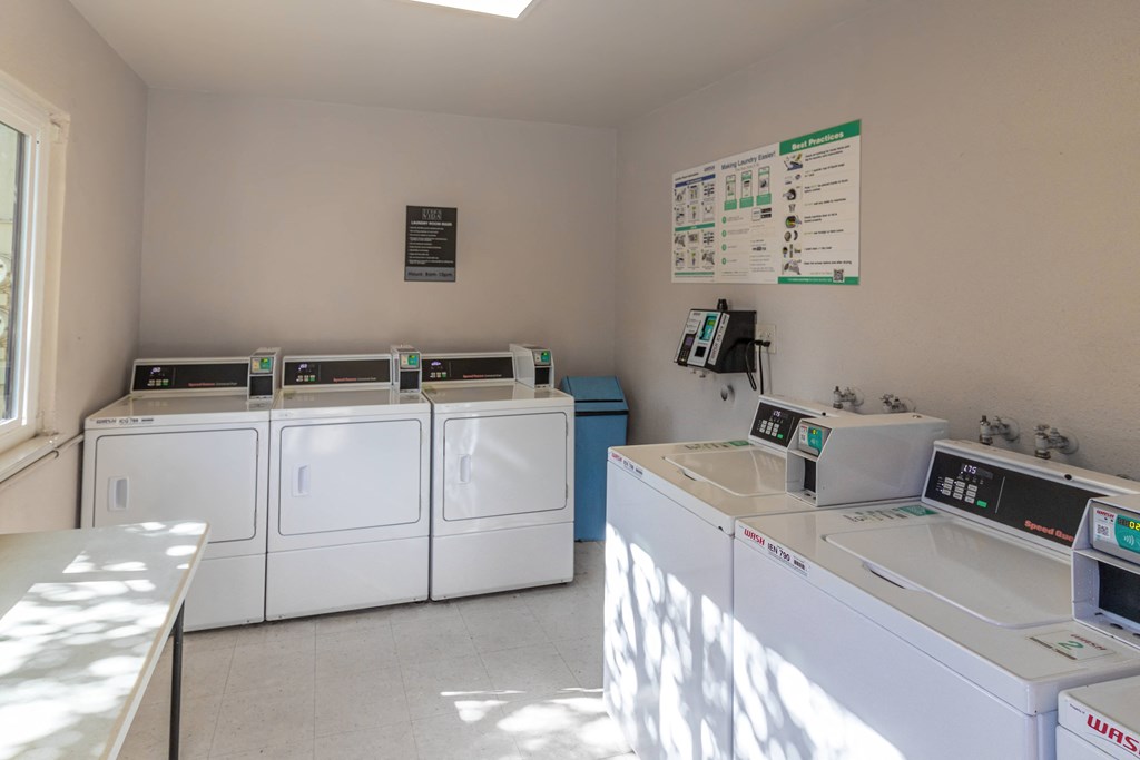 the laundry room is equipped with washes and dryers