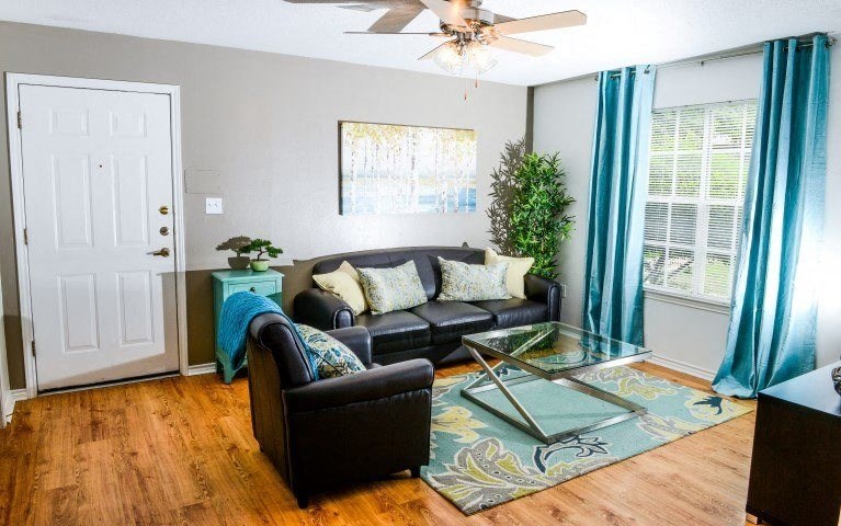 Living room with window and wood floors
