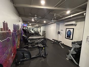 A gym with treadmills, exercise bikes at LOFT 205 Apartments, Reno 89501