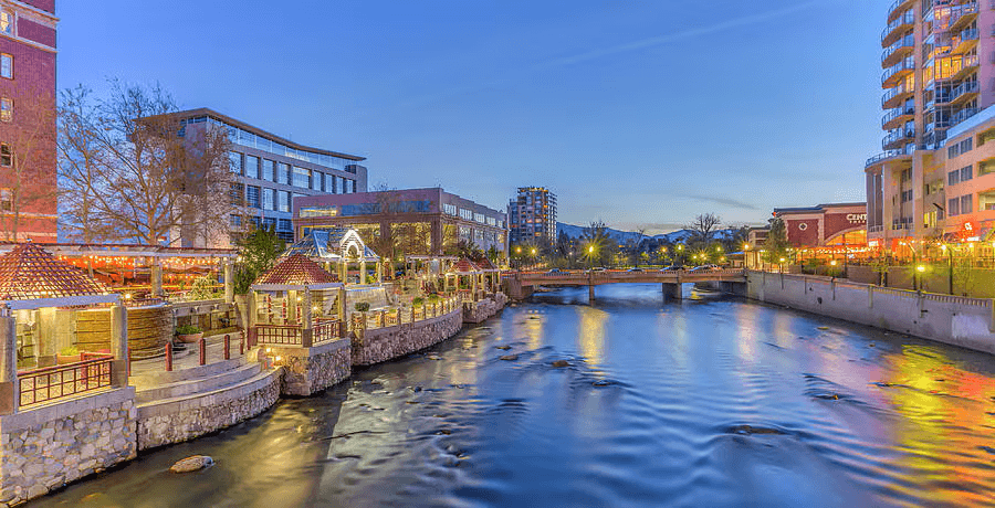A river flows through a city with buildings on both sides at LOFT 205 Apartments, Nevada