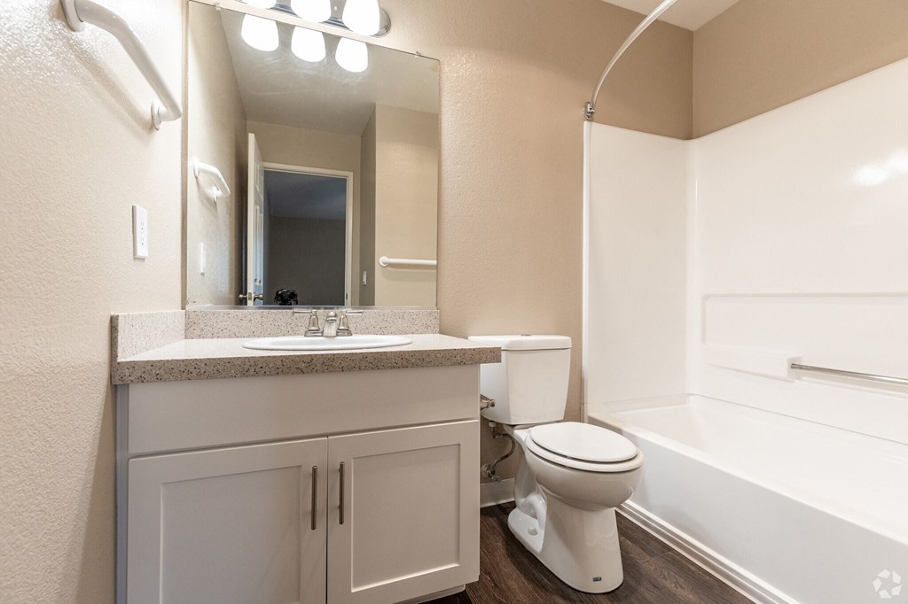  apartment bathroom with sink toilet and tub