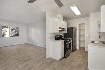 Kitchen and dining area with wood floors - Photo Gallery 2