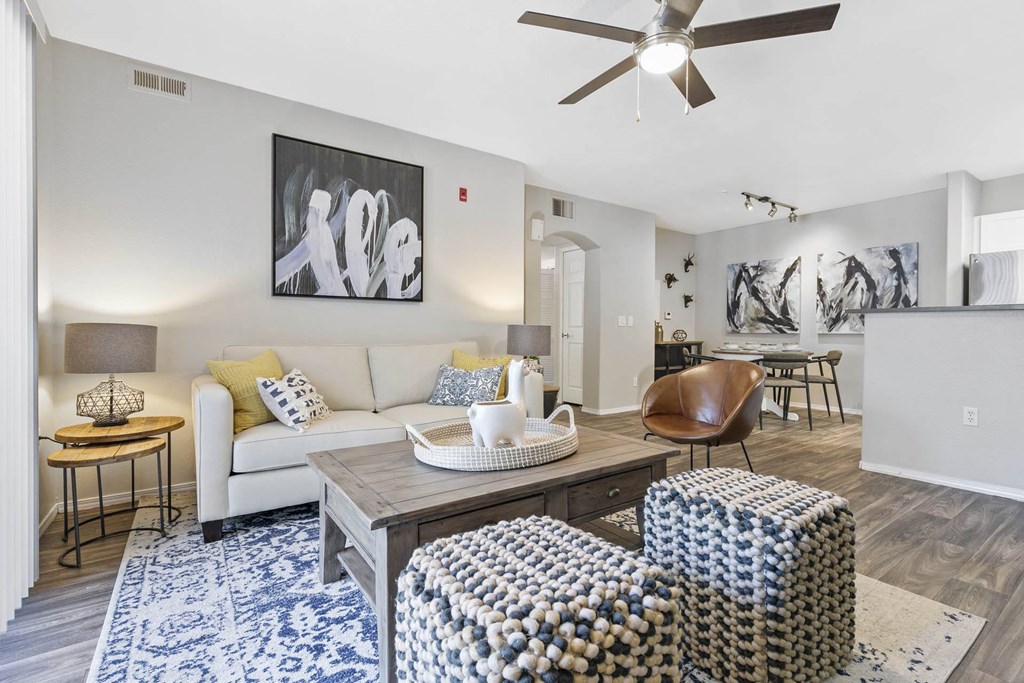 a living room with a couch and a table  at Ascent Apartments, Cottonwood Heights, UT 84121