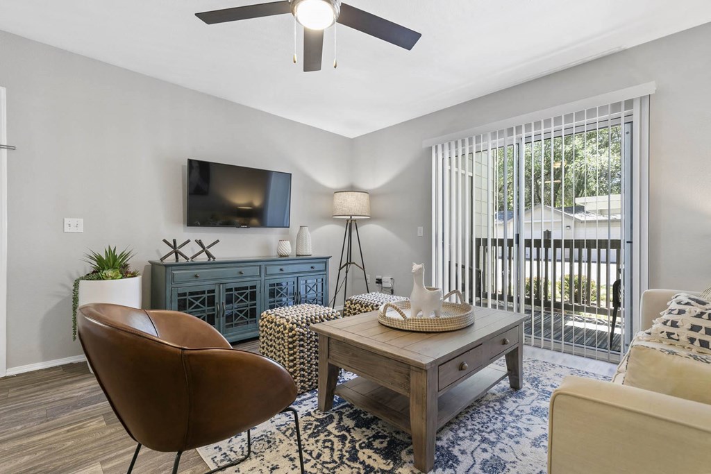 a living room with a couch and a table at Ascent Apartments, Cottonwood Heights Utah