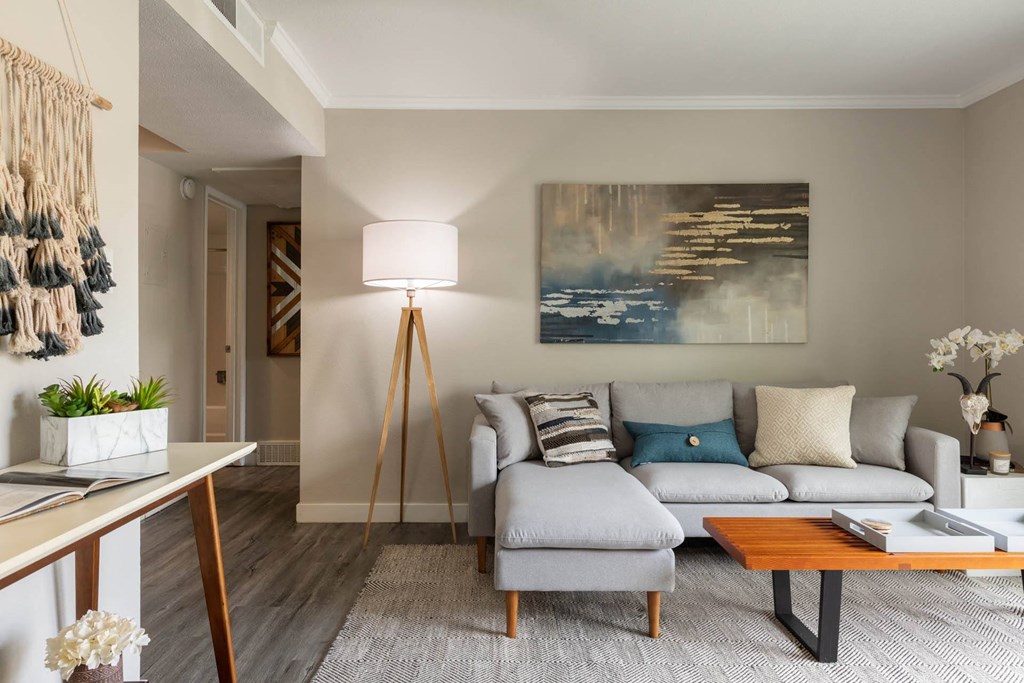 a living room with a couch and a table at Park Capitol, Utah, 84103