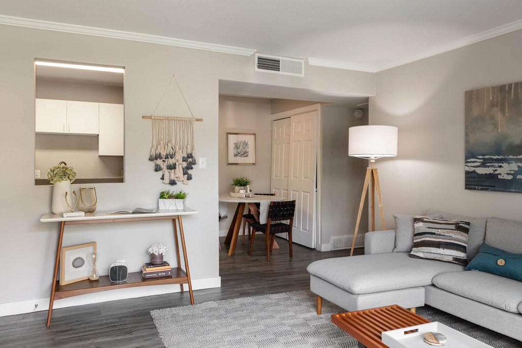 a living room with a couch and a table  at Park Capitol, Salt Lake City, UT 84103