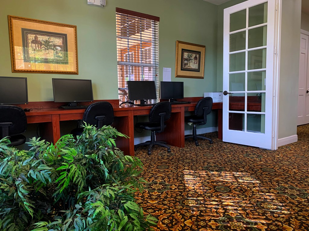 Portofino Apartments business center with computer