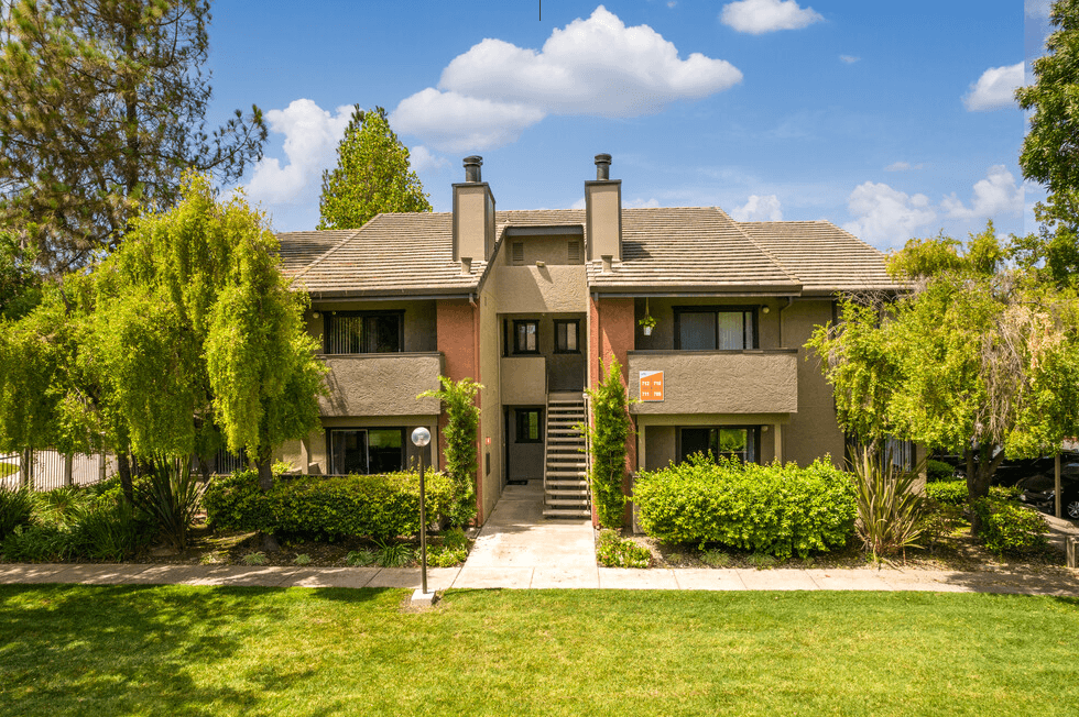 Exterior building with grass near sidewalk