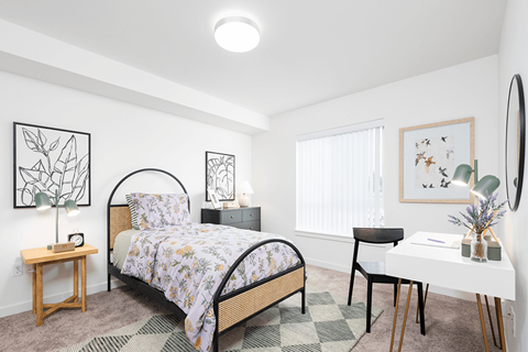 a bedroom with a bed and a desk at QUINN BY VINTAGE, Shoreline, WA, 98155