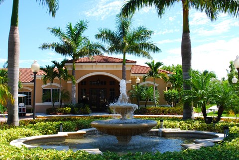 Renaissance community exterior with palm trees and fountain at Renaissance, West Palm Beach, Florida