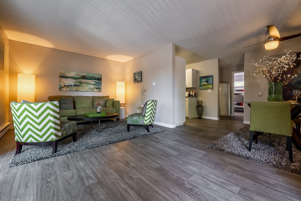 Renton Sage living area with plank flooring