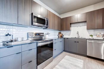 Double R kitchen with stainless steel appliances and lots of cabinetry - Photo Gallery 30