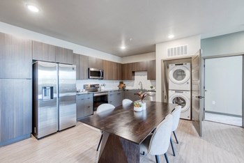 Double R kitchen with full size stacked washer and dryer - Photo Gallery 17