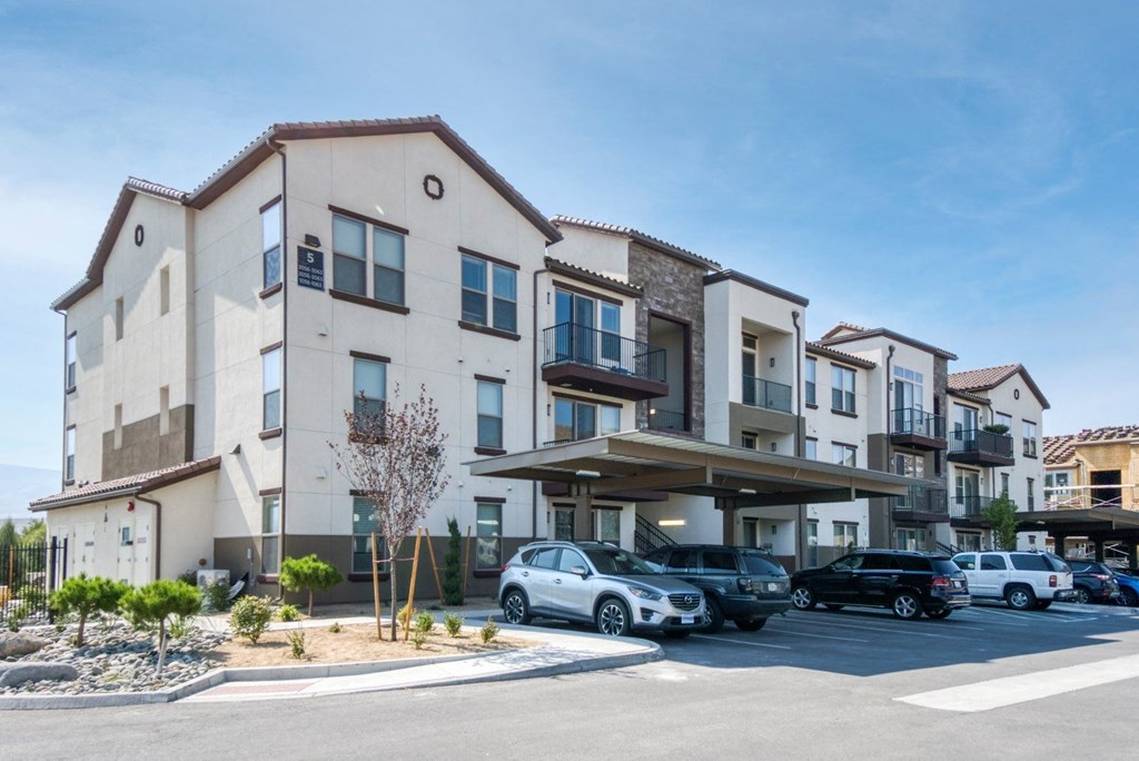 Double R community exterior with carports